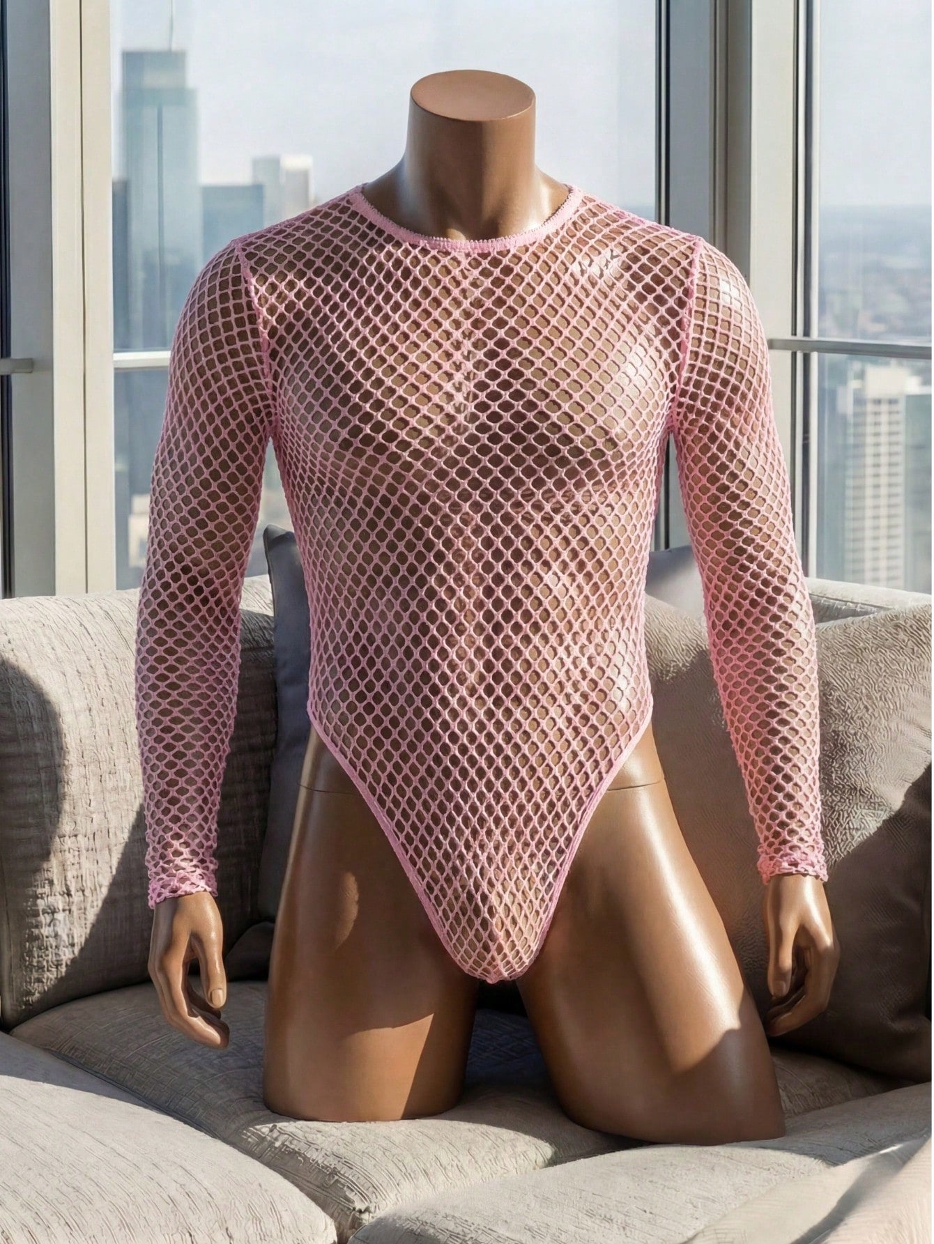 Men's pink hollow crochet base layer top with round neck, long sleeves, slim fit, and short length in stretch knitted fabric.