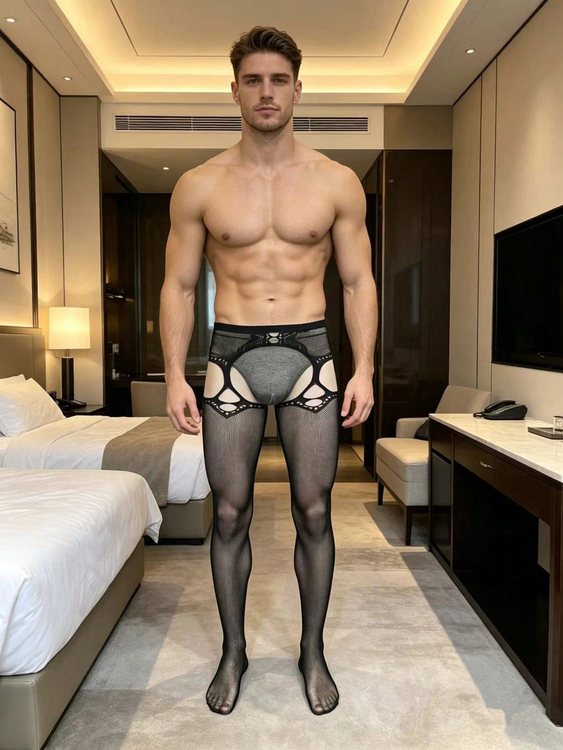 Black fishnet bodystocking for men with a sheer plain design, crotchless style, low rise fit, and high-stretch knitted polyamide fabric.