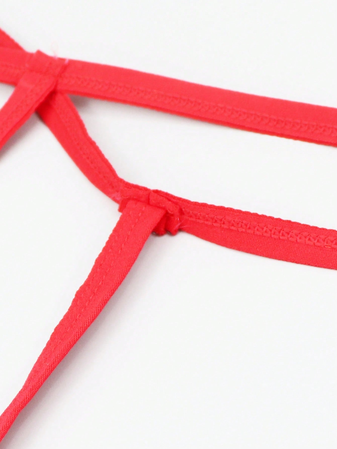 Men's mid-rise mesh thong underwear with U-pouch design, plain pattern, made from polyamide and elastane blend.