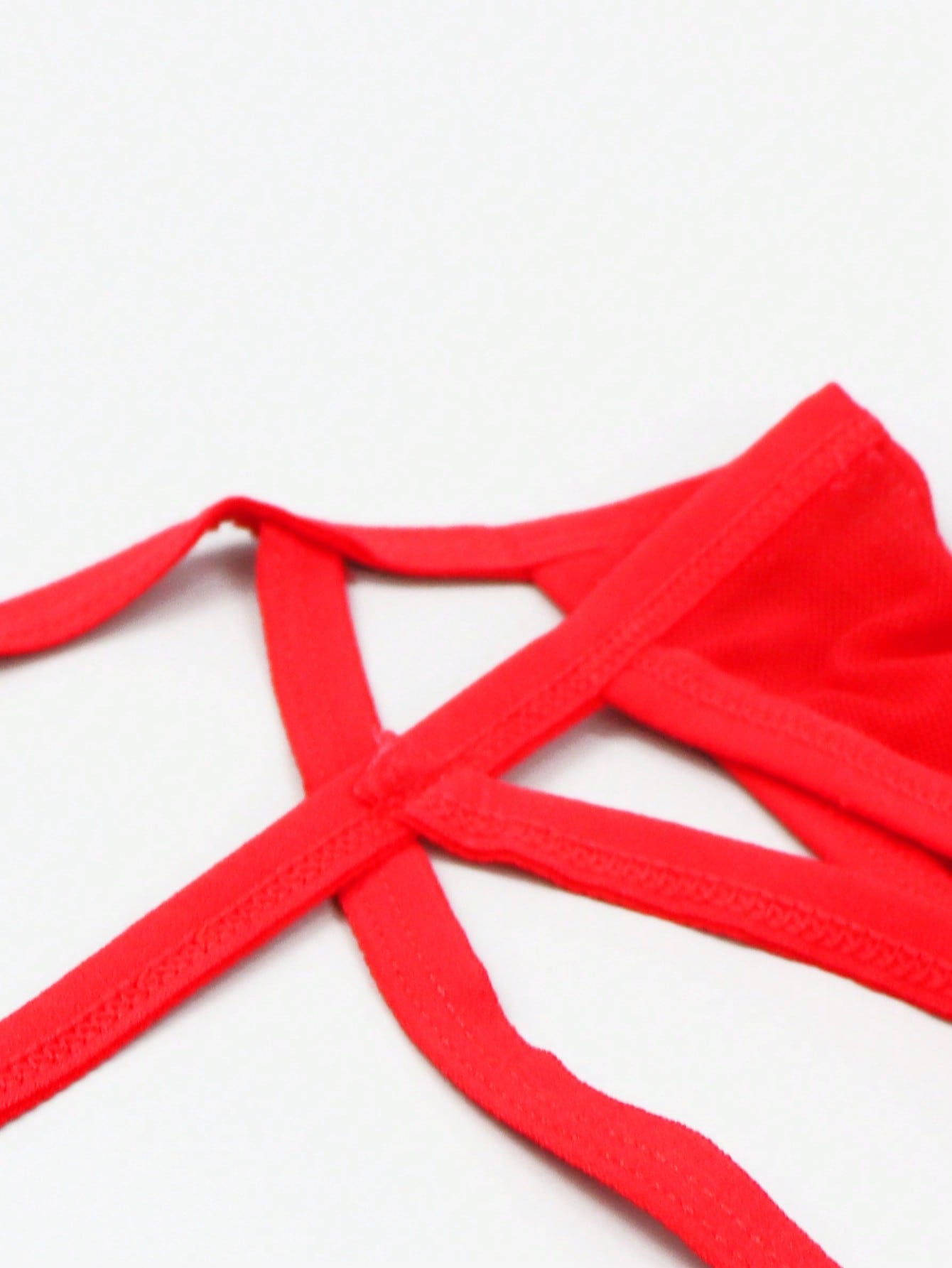 Men's mid-rise mesh thong underwear with U-pouch design, plain pattern, made from polyamide and elastane blend.