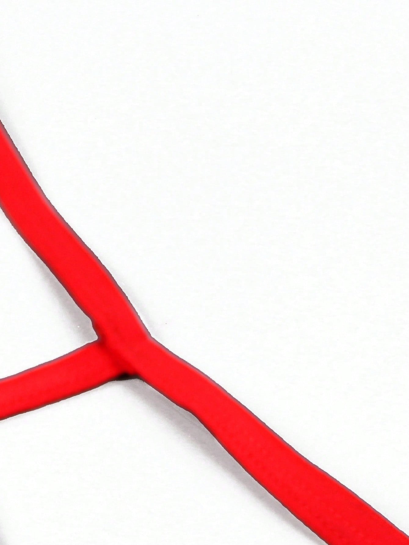 Red men's low rise thong underwear with contrast lace trim, letter pattern, and medium-stretch knitted fabric in 97% polyamide and 3% elastane.