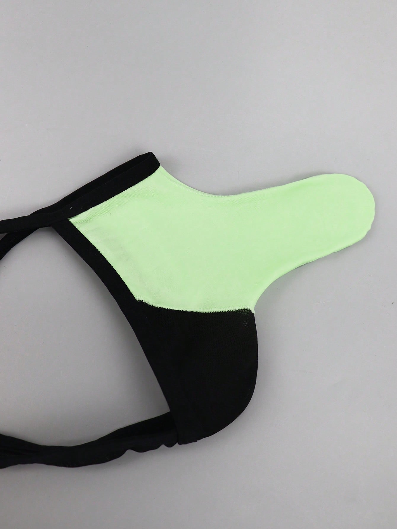 Men's multicolor mesh thong underwear with a plain design and mid-rise fit, made from stretchy polyester and elastane blend.