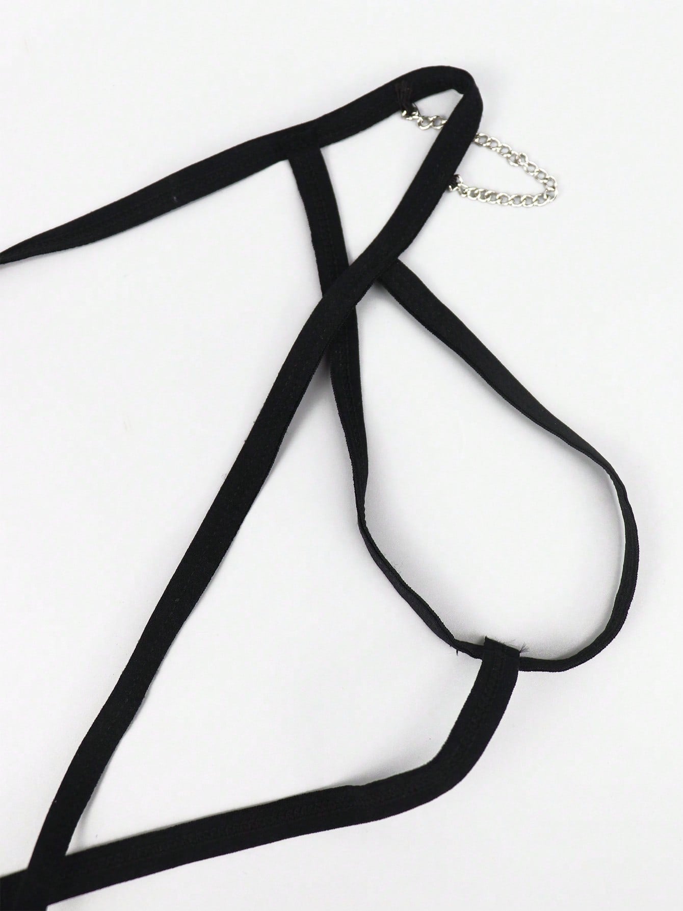 Black men's colorblock thong underwear in knitted fabric with a low rise fit and medium stretch.