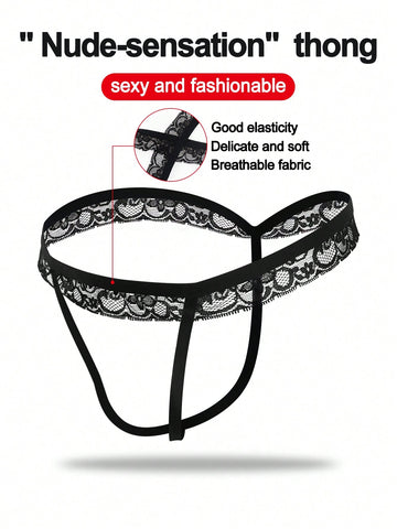 Black men's low rise thong underwear in knitted fabric with lace styling, letter pattern, medium stretch, and a non-sheer finish.