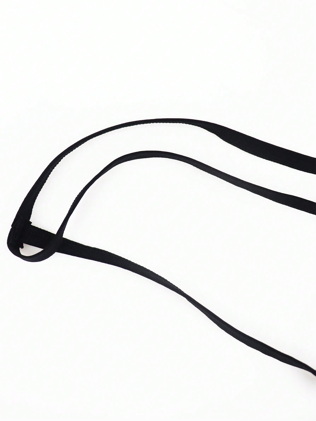 Black men's thong underwear with fringe detail, mid-rise fit, plain design, and knitted fabric construction.
