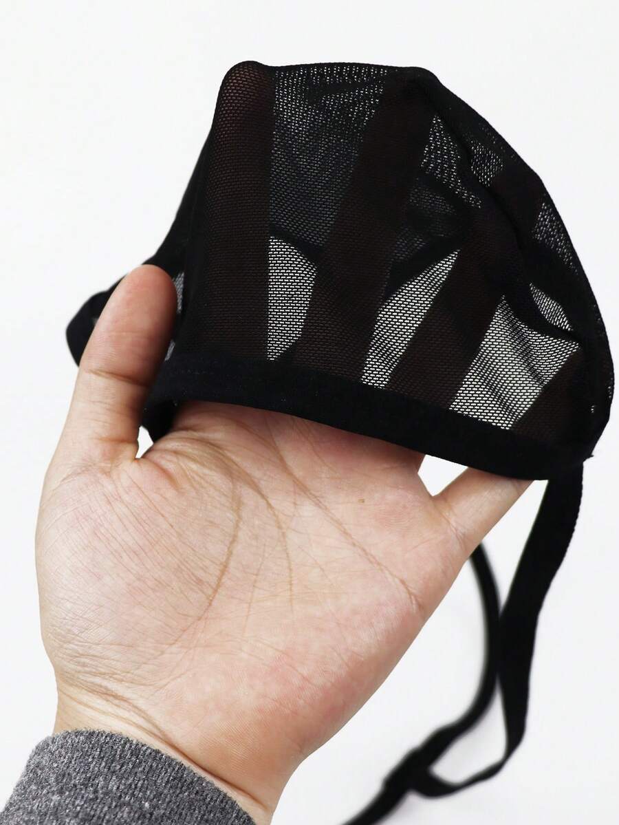 Men's black mid-waist thong underwear crafted from breathable mesh fabric.