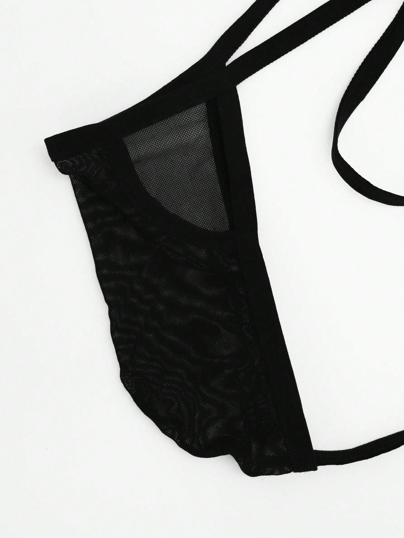 Black men's mesh thong underwear with colorblock design, mid-rise waist, and medium-stretch fabric for couple lingerie styling.