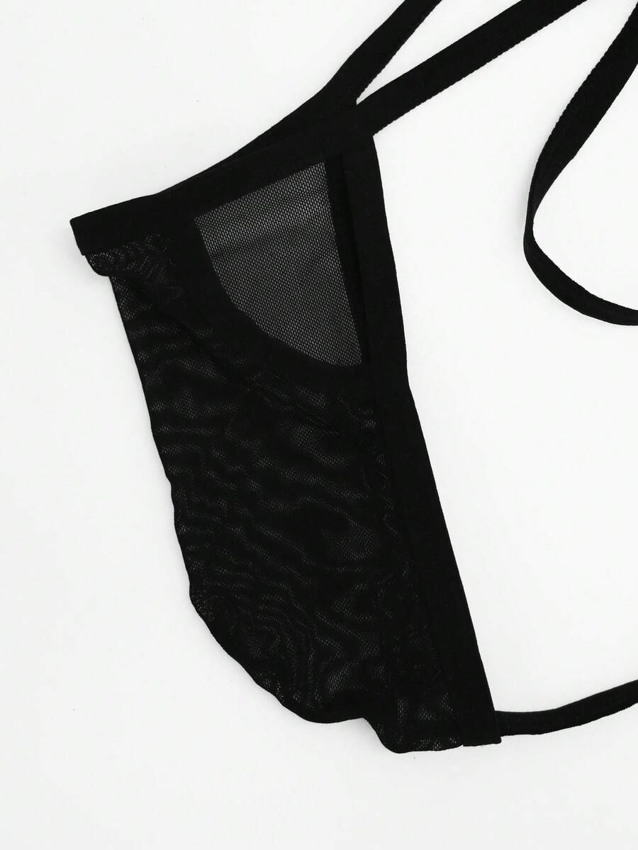 Men's black mid-waist thong underwear crafted from breathable mesh fabric.