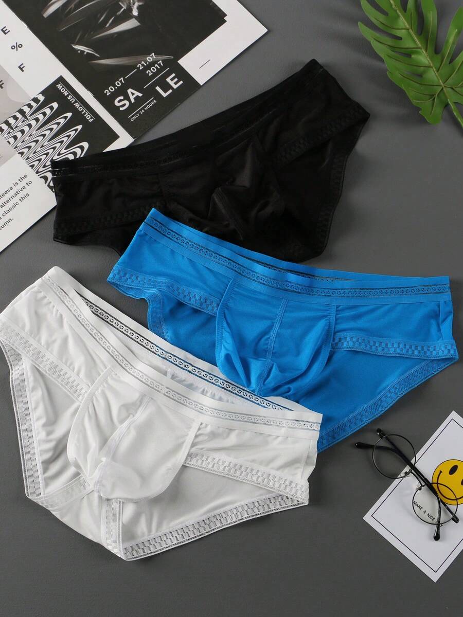 3-pack of men's low rise triangle briefs in assorted random colors made from breathable quick-drying fabric.