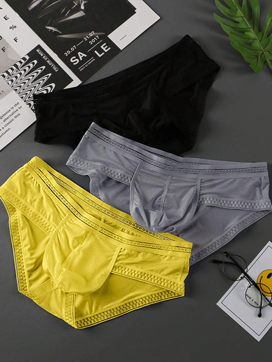 3-pack of men's low rise triangle briefs in assorted random colors made from breathable quick-drying fabric.