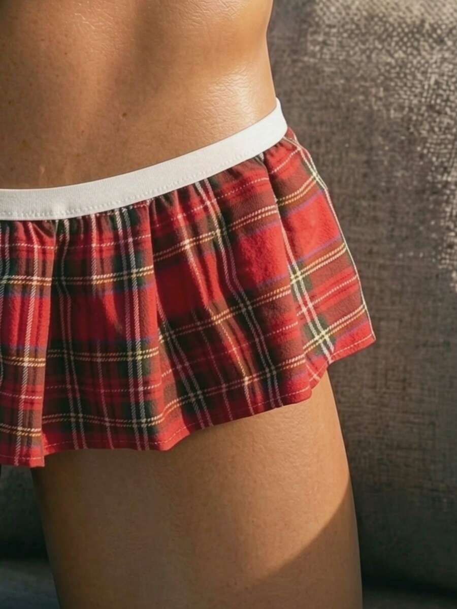 Men's low rise plaid Christmas thong in multicolor red designed for holiday roleplay and couples.