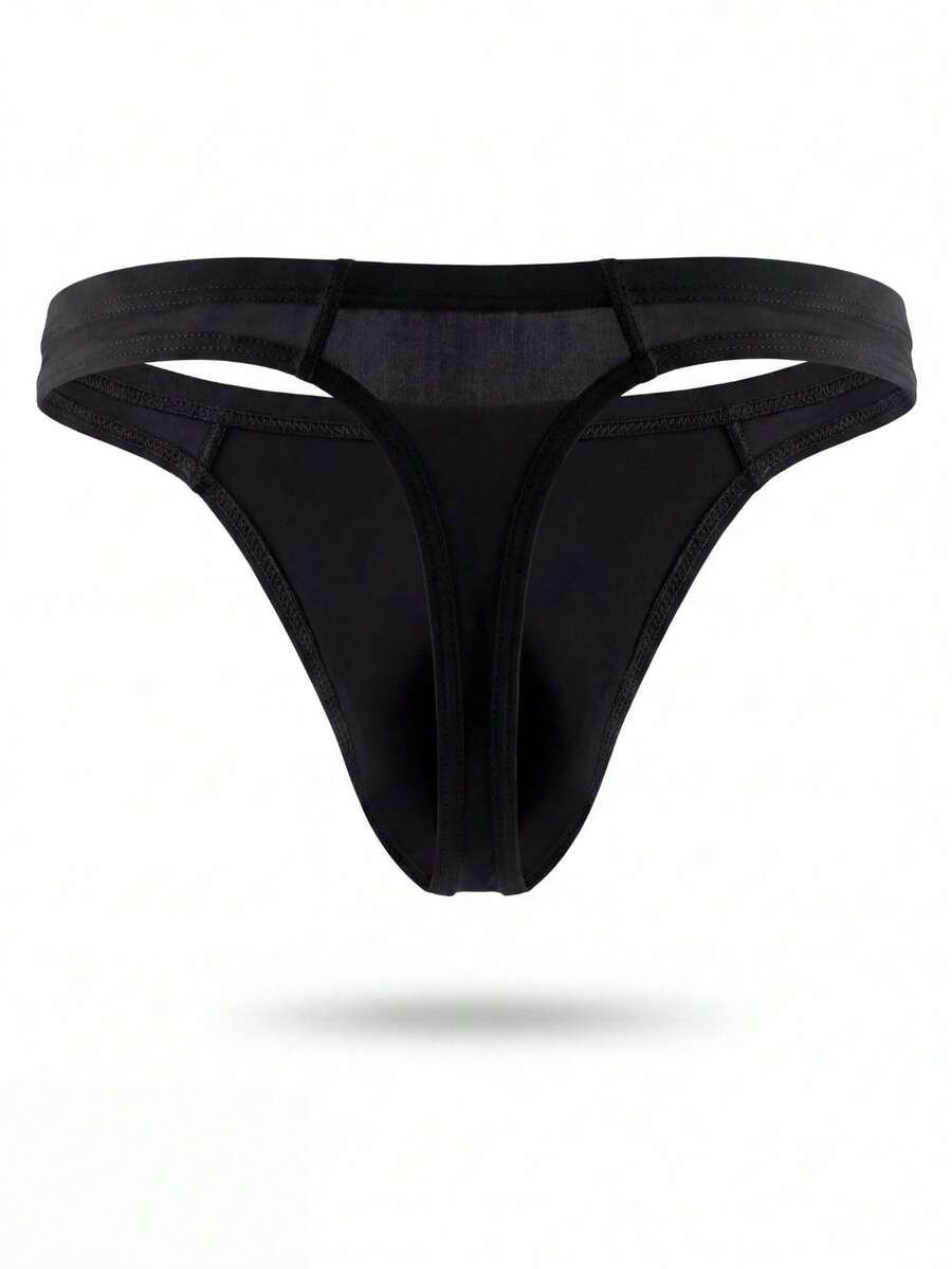 Men's solid color low-rise hollow out thong underwear made of flexible stretch fabric.