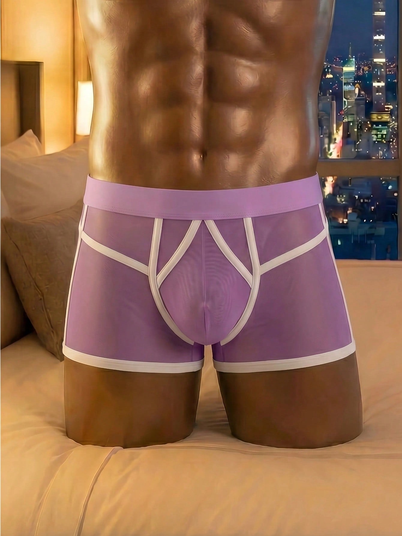 Men's mesh boxer shorts with colorblock design, contrast trim, and mid-rise fit.