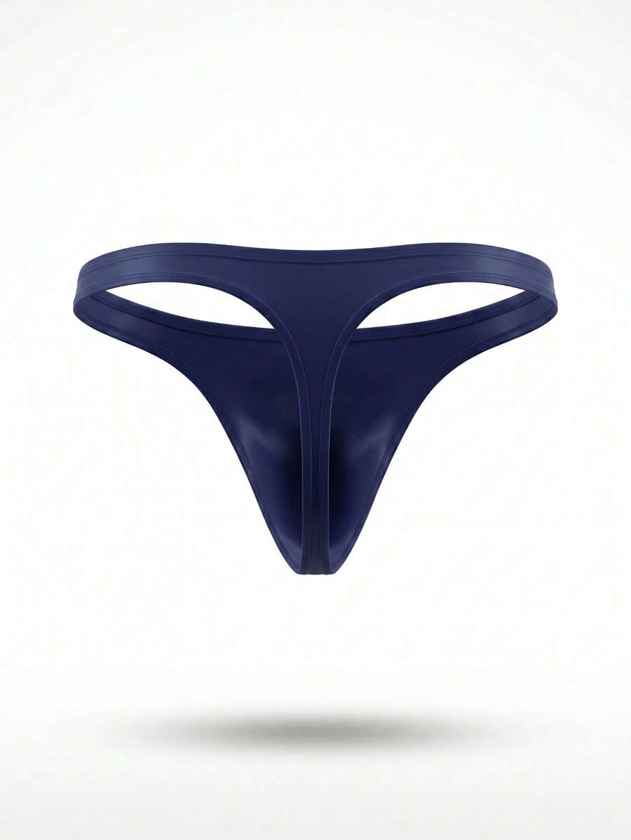 Men's solid color low-rise hollow out thong underwear made of flexible stretch fabric.