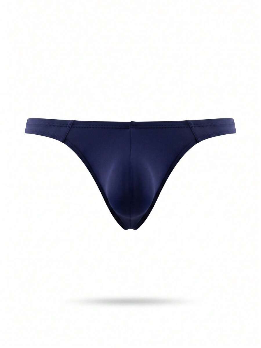 Men's solid color low-rise hollow out thong underwear made of flexible stretch fabric.