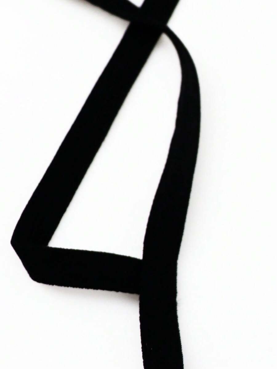 Red low-rise men's mesh thong underwear featuring a colorblock letter waistband and bulge-enhancing front pouch.