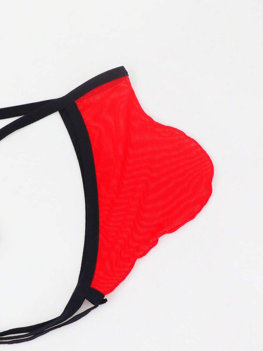 Red low-rise men's mesh thong underwear featuring a colorblock letter waistband and bulge-enhancing front pouch.