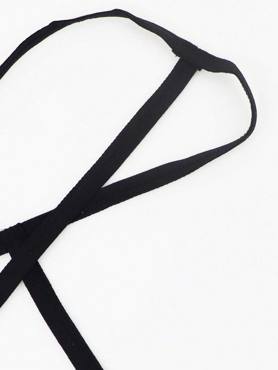 Red low-rise men's mesh thong underwear featuring a colorblock letter waistband and bulge-enhancing front pouch.