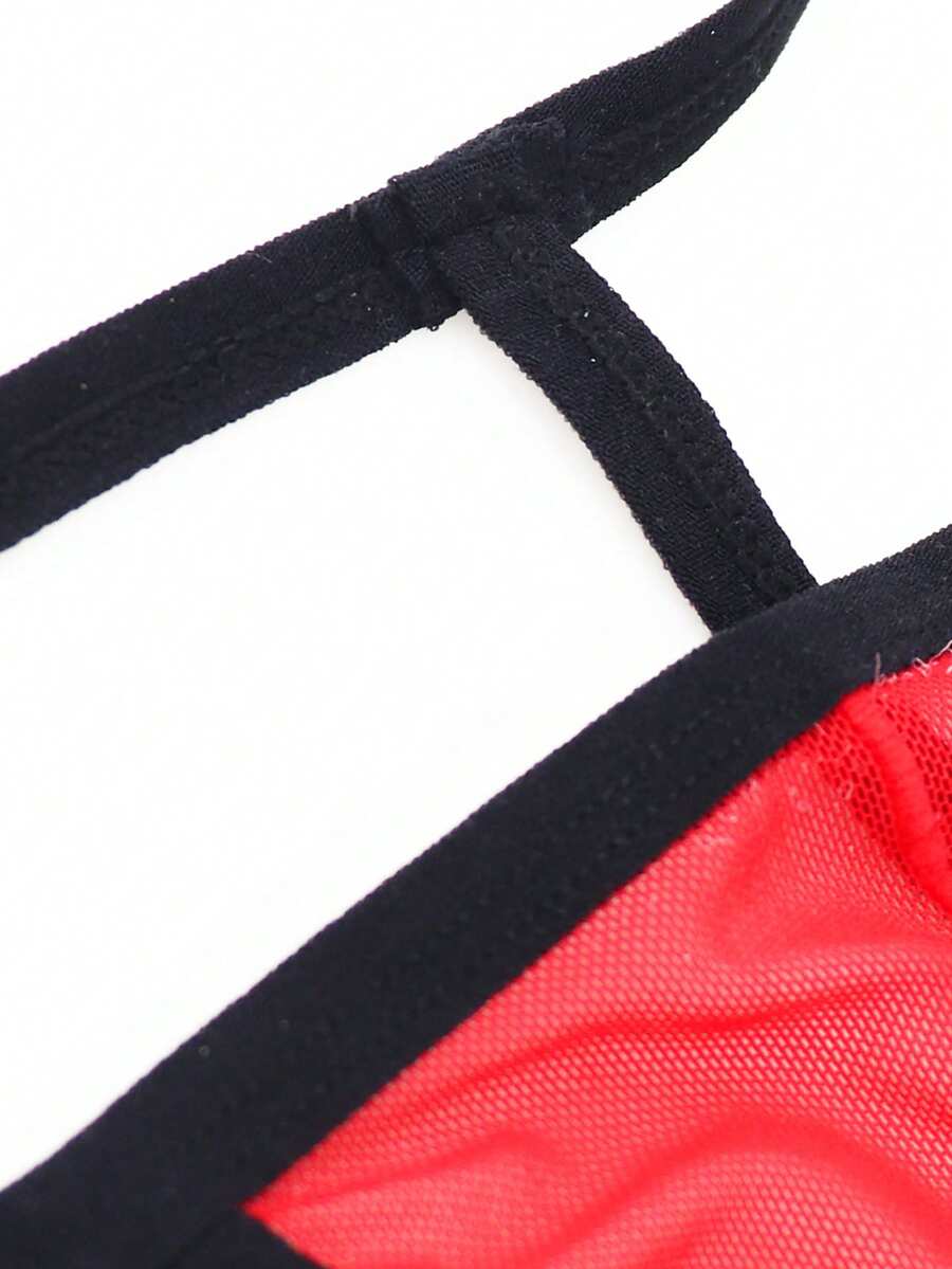 Red low-rise men's mesh thong underwear featuring a colorblock letter waistband and bulge-enhancing front pouch.