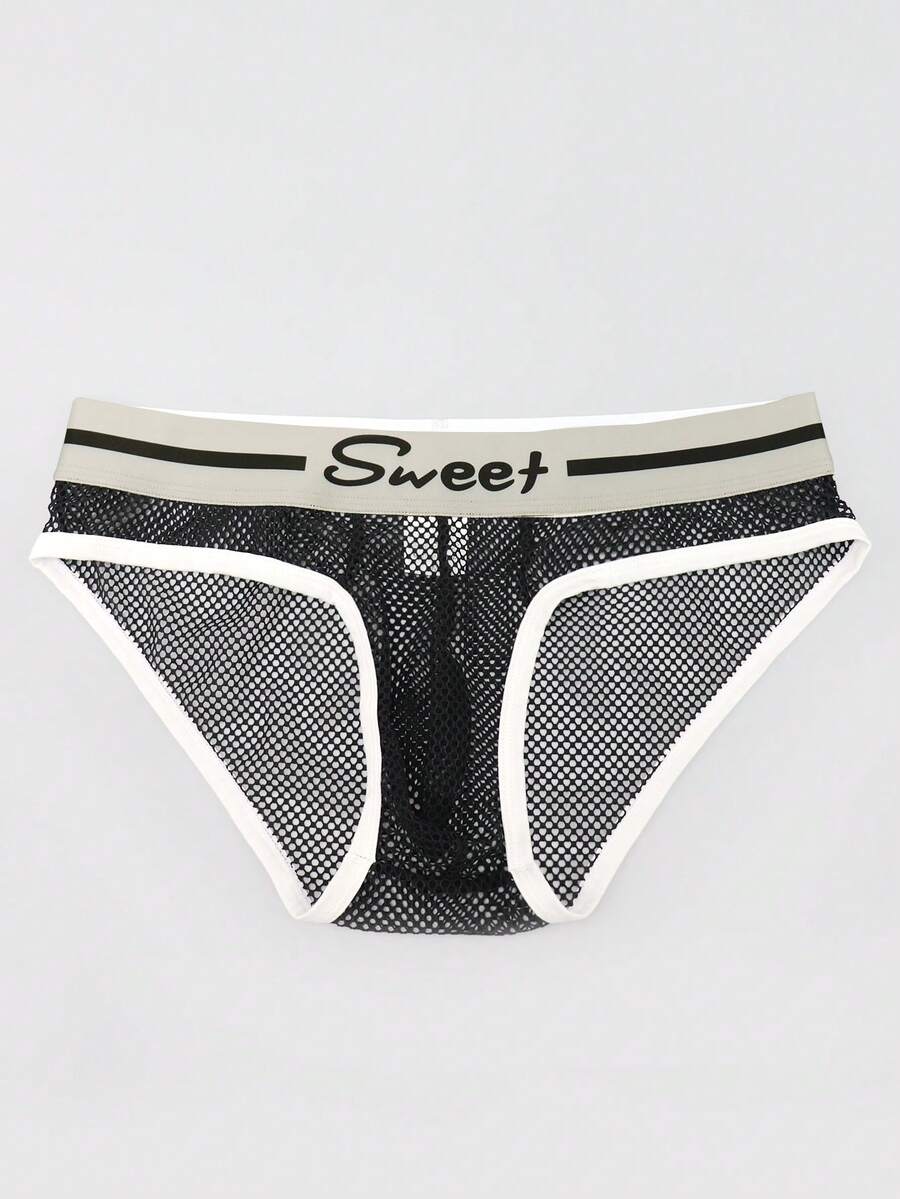 Black low-rise men's mesh briefs featuring contrast binding and tape details