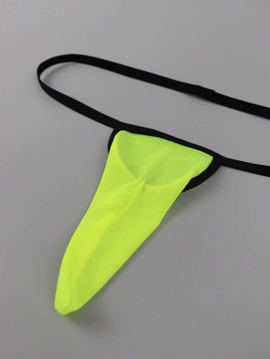 Yellow mesh jockstrap for men with a mid-rise waist, hollow U-convex pouch design, and breathable stretch polyamide fabric.