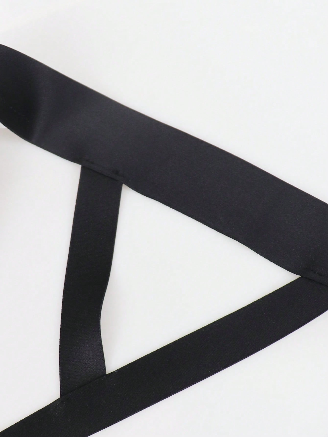Men's solid color jockstrap underwear in knitted fabric with a breathable hollow design, low rise fit, plain pattern, and medium stretch for daily wear.
