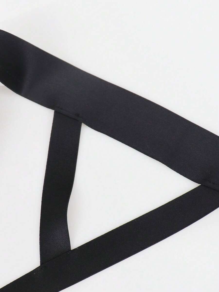 Red men's low-rise jockstrap underwear featuring criss-cross cut-out details in medium stretch knitted fabric.