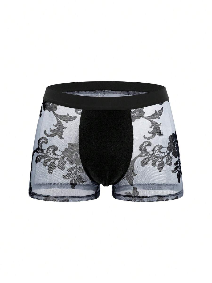 Black mid-rise men's boxer briefs featuring contrast binding and semi-sheer high-stretch fabric with a Halloween pattern.