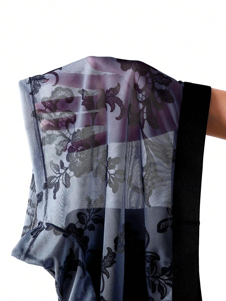 Black mid-rise men's boxer briefs featuring contrast binding and semi-sheer high-stretch fabric with a Halloween pattern.
