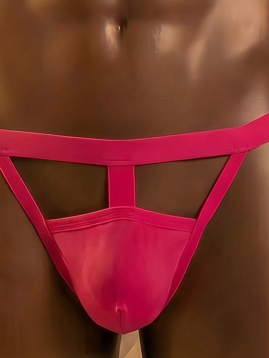 Men's hot pink low rise jockstrap underwear with criss cross detailing