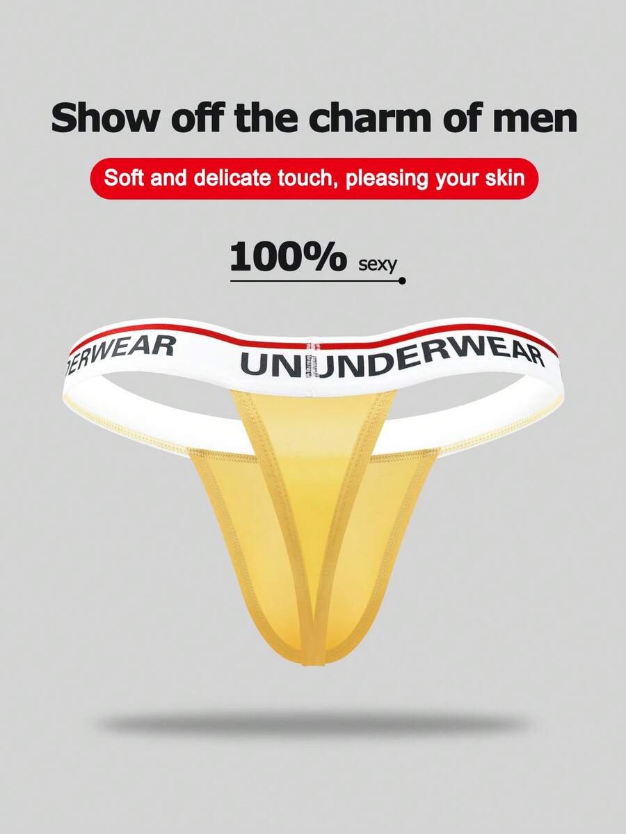 Low rise men's thong underwear with rhinestone letter print detail.