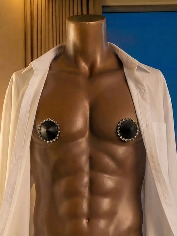 Single black rivet-decorated studded nipple cover for men made of metallic 100% viscose fabric.