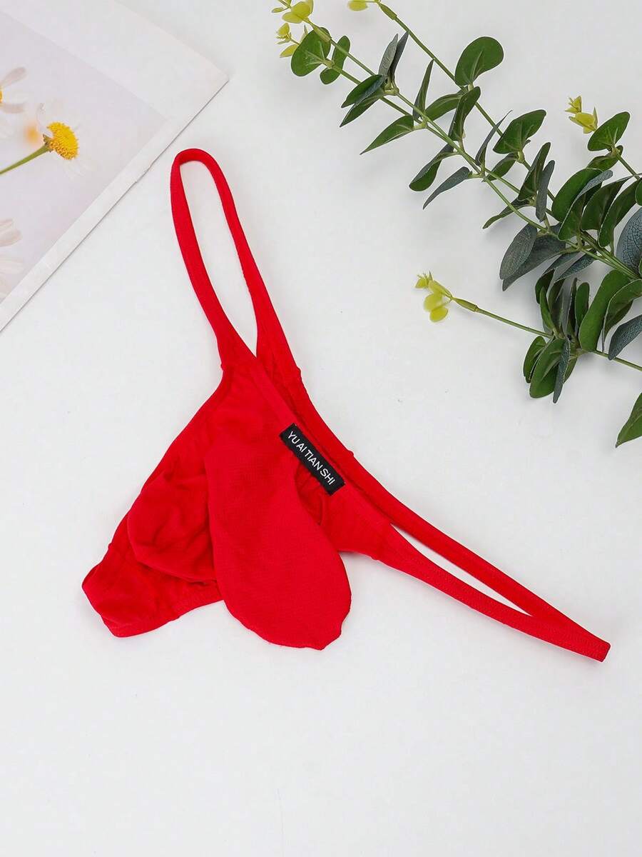3-pack of men's low-rise g-string thong underwear featuring a bulge pouch design, breathable mesh fabric, and high elastic waistband.