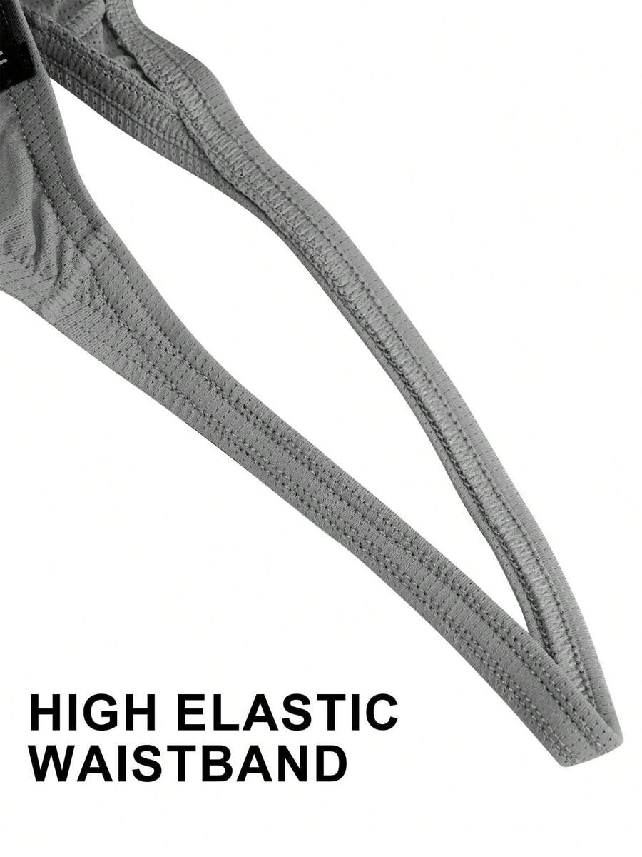 3-pack of men's low-rise g-string thong underwear featuring a bulge pouch design, breathable mesh fabric, and high elastic waistband.