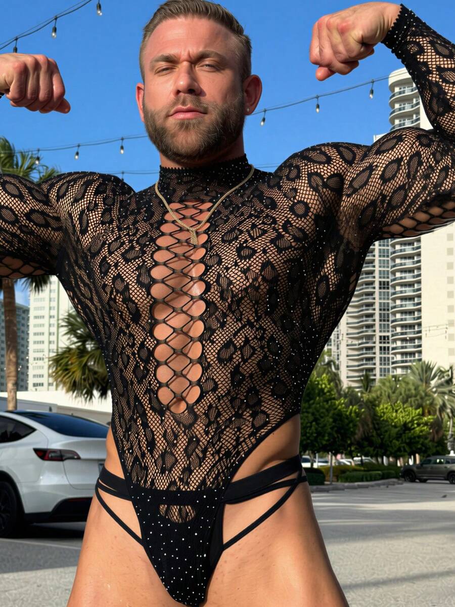 Front view of a men's black sheer hollow-out long jumpsuit featuring a stand collar