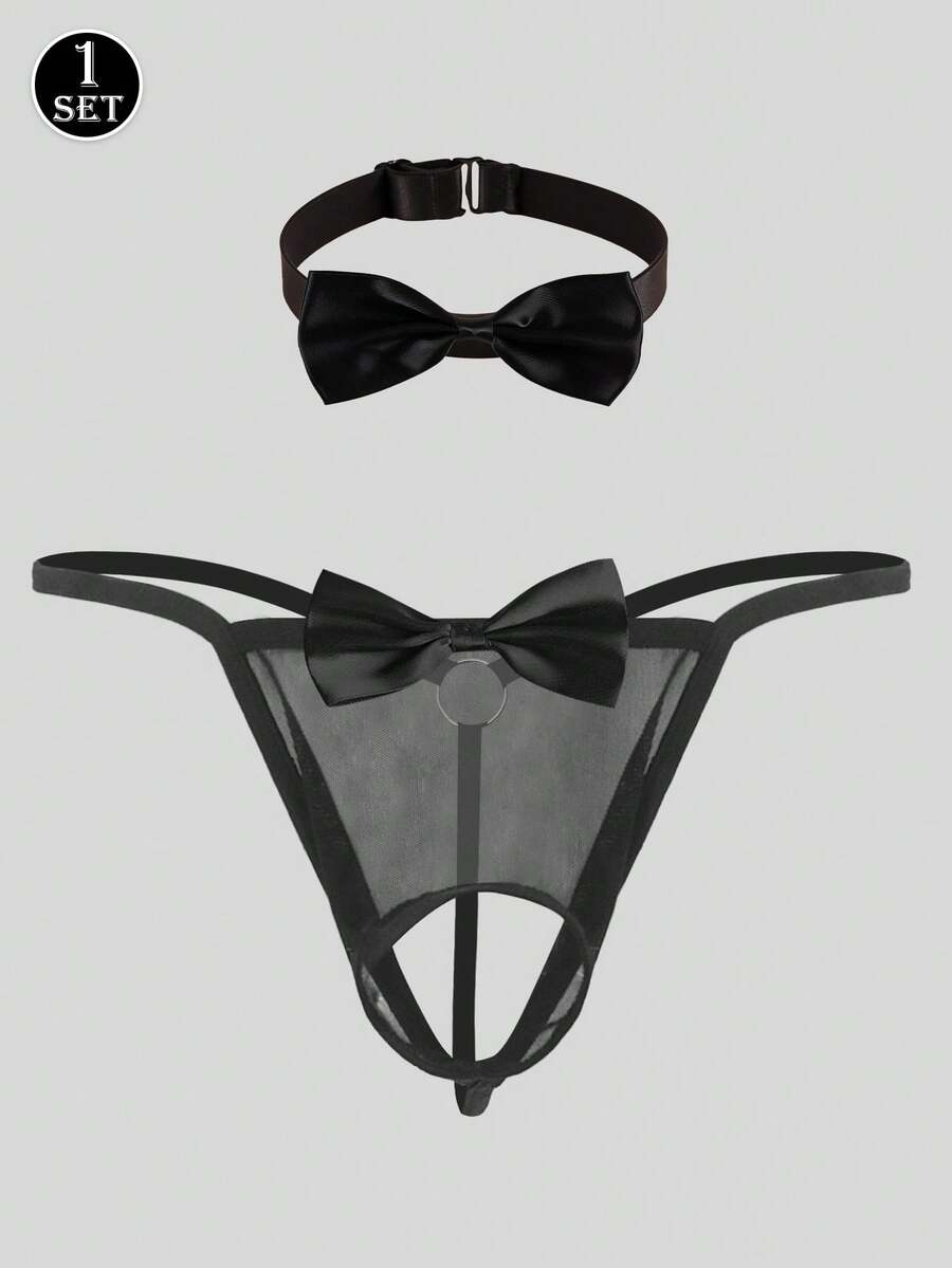 Black 2-piece men's semi-sheer thong set featuring bow and ring decor with a matching neck collar.