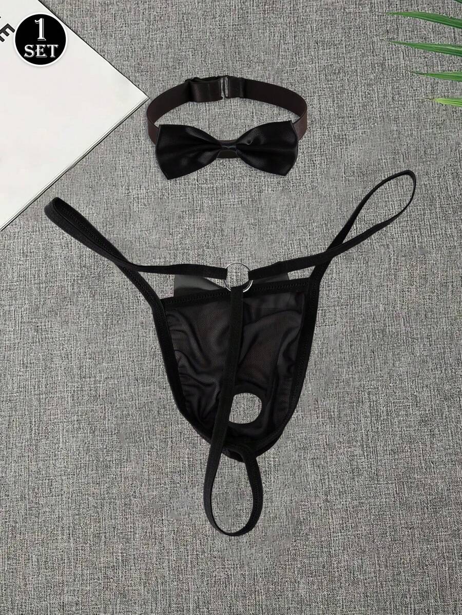 Black 2-piece men's semi-sheer thong set featuring bow and ring decor with a matching neck collar.