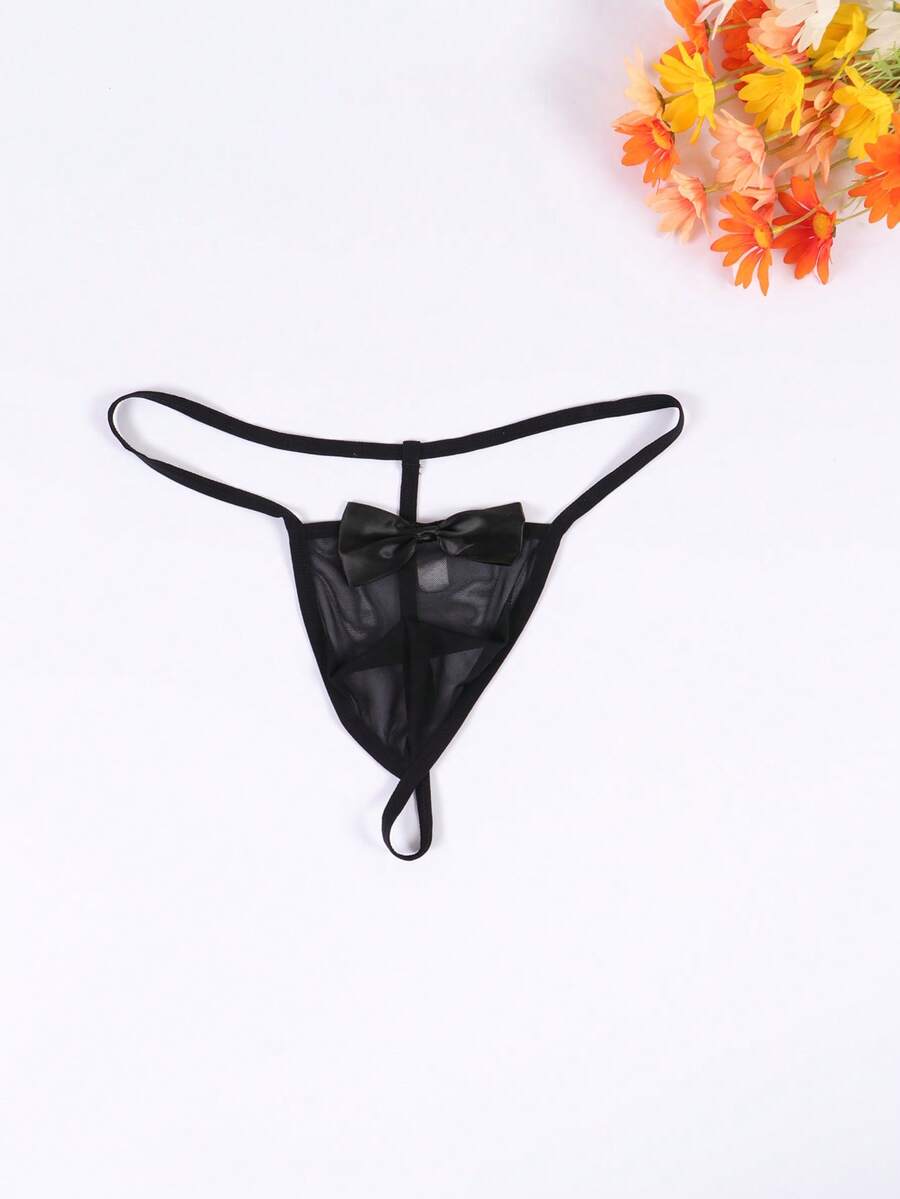 Black 2-piece men's semi-sheer thong set featuring bow and ring decor with a matching neck collar.