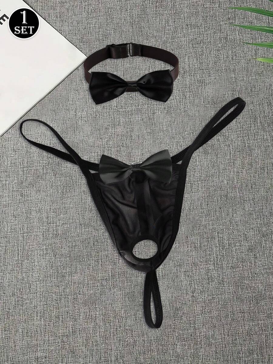 Black 2-piece men's semi-sheer thong set featuring bow and ring decor with a matching neck collar.