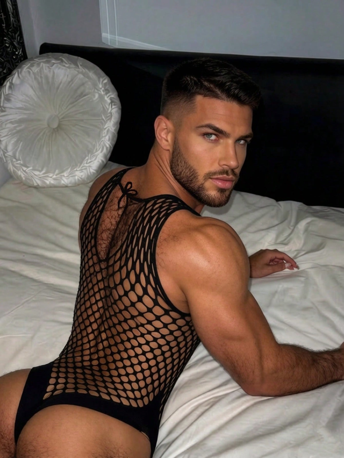 Black sheer fishnet bodystocking for men featuring a hollow-out pattern, crew neck design, and high stretch knit fabric.