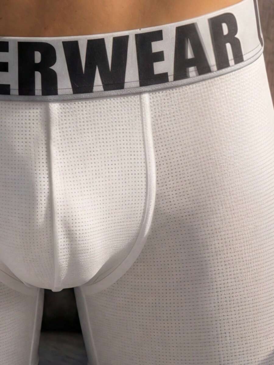 Front view of men's plain white low rise square cut boxer shorts made of stretch knitted fabric.