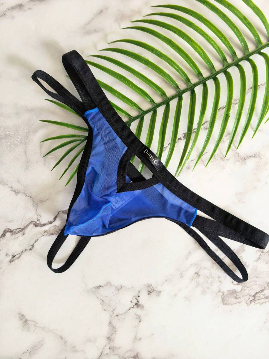 Men's black mesh G-string thong underwear featuring a low-waist cut-out front design.