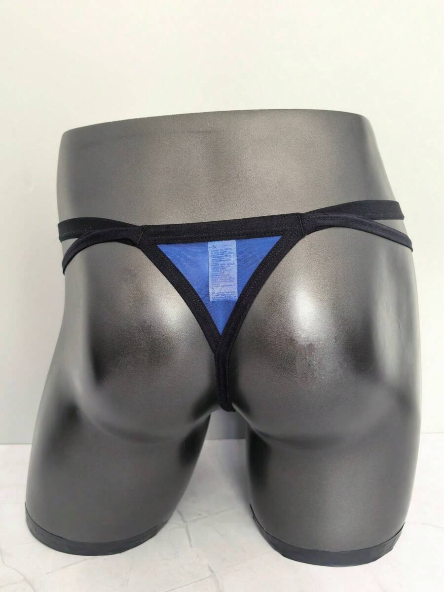 Men's black mesh G-string thong underwear featuring a low-waist cut-out front design.