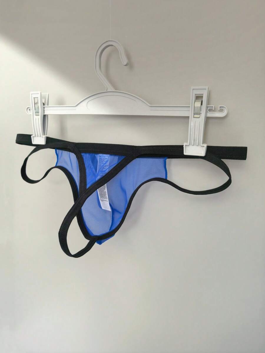 Men's black mesh G-string thong underwear featuring a low-waist cut-out front design.