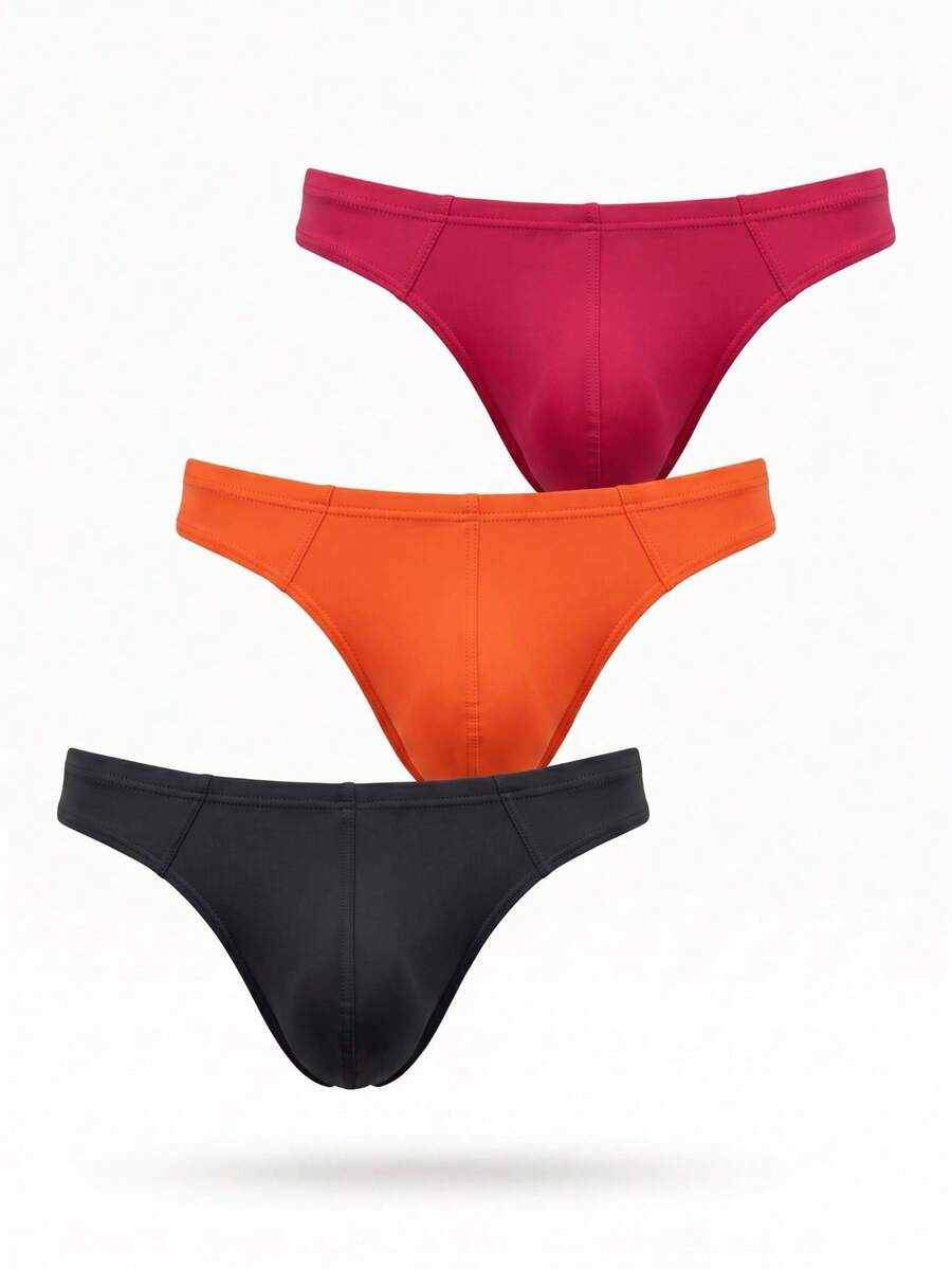 3-pack of men's low-rise solid color thongs made from high-stretch polyamide blend fabric