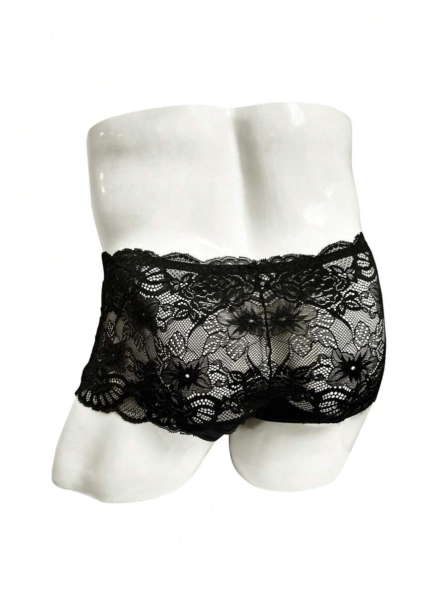 Black lace boxer briefs for men featuring a naughty Halloween style and mid-rise fit.
