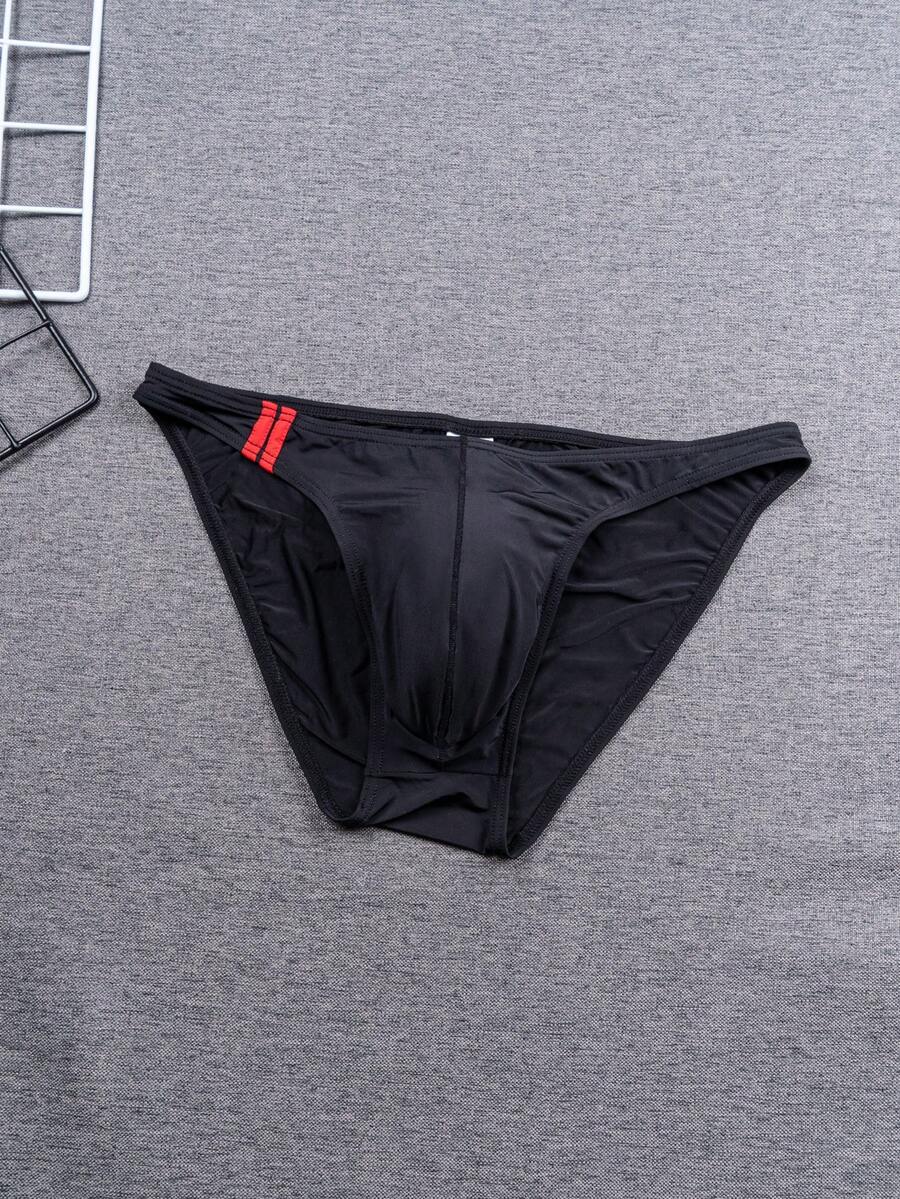 Multicolor men's low-rise briefs with contrast piping made from soft stretch knitted fabric.