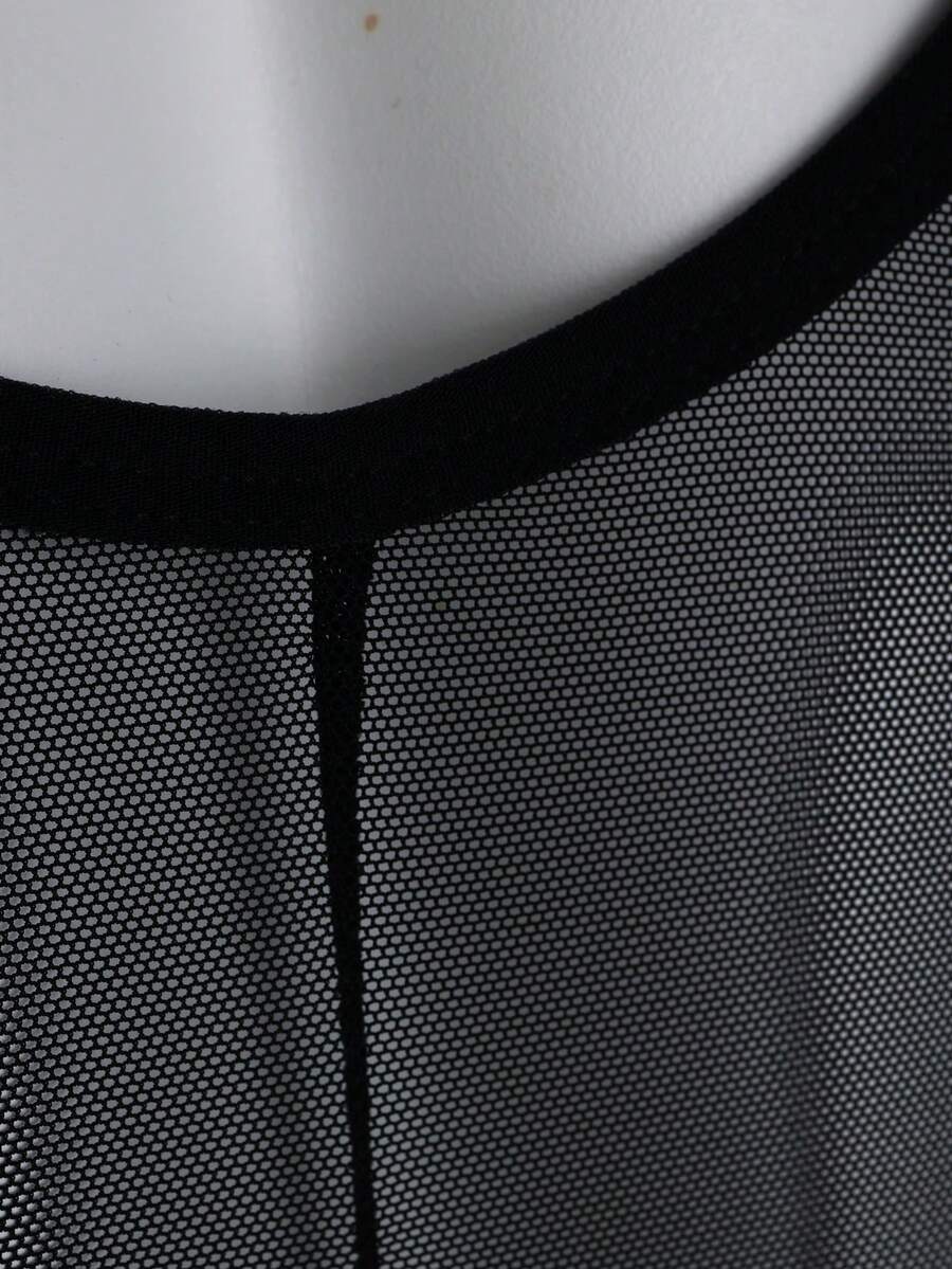 Black scoop neck sheer romper boxer shorts for men featuring low rise fit and knitted fabric.