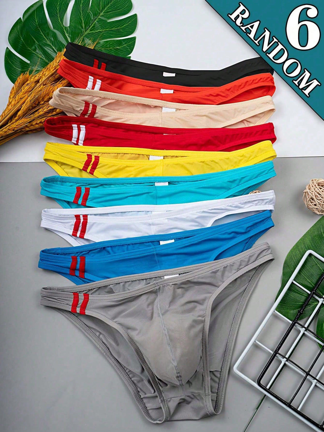 Multicolor men's low-rise briefs with contrast piping made from soft stretch knitted fabric.