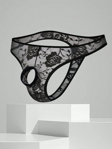 Men's black semi-sheer floral lace thong underwear featuring cut out design and low rise waistband.